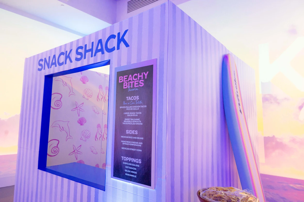 Kira Snack Shack signage and coastal event graphics