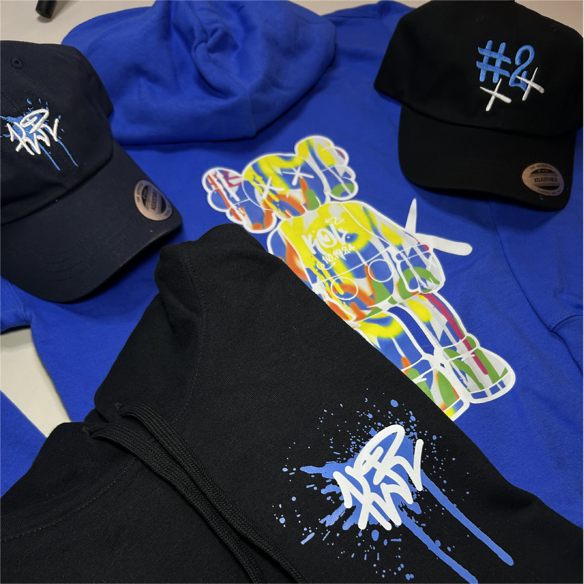 Kol character T-shirt and caps