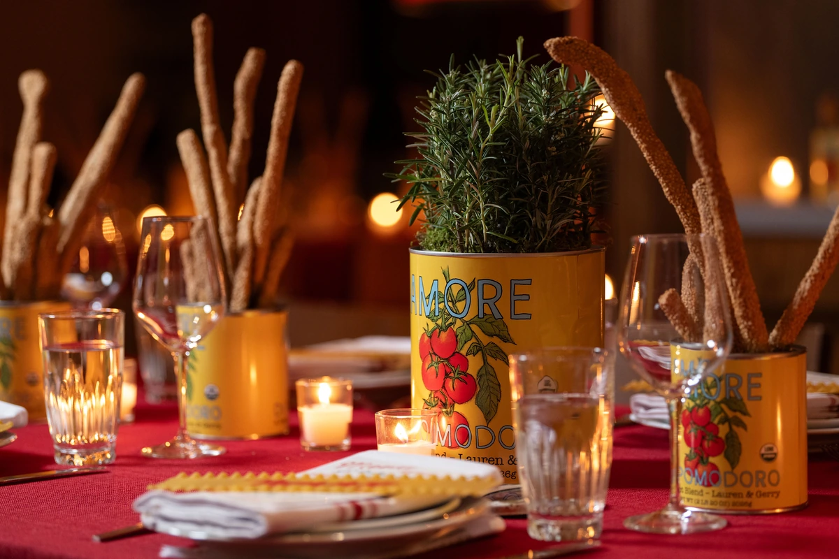 Lauren & Gerry custom Amore cans on the wedding table