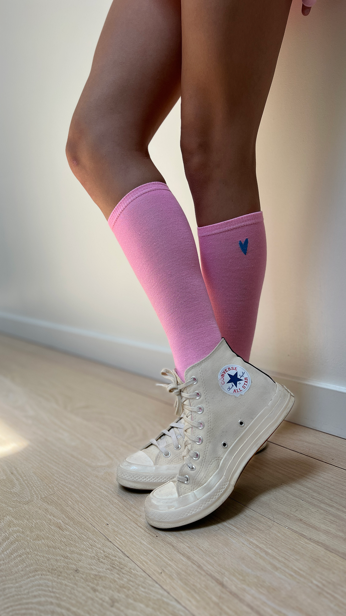 Sadie pink socks and white sneakers