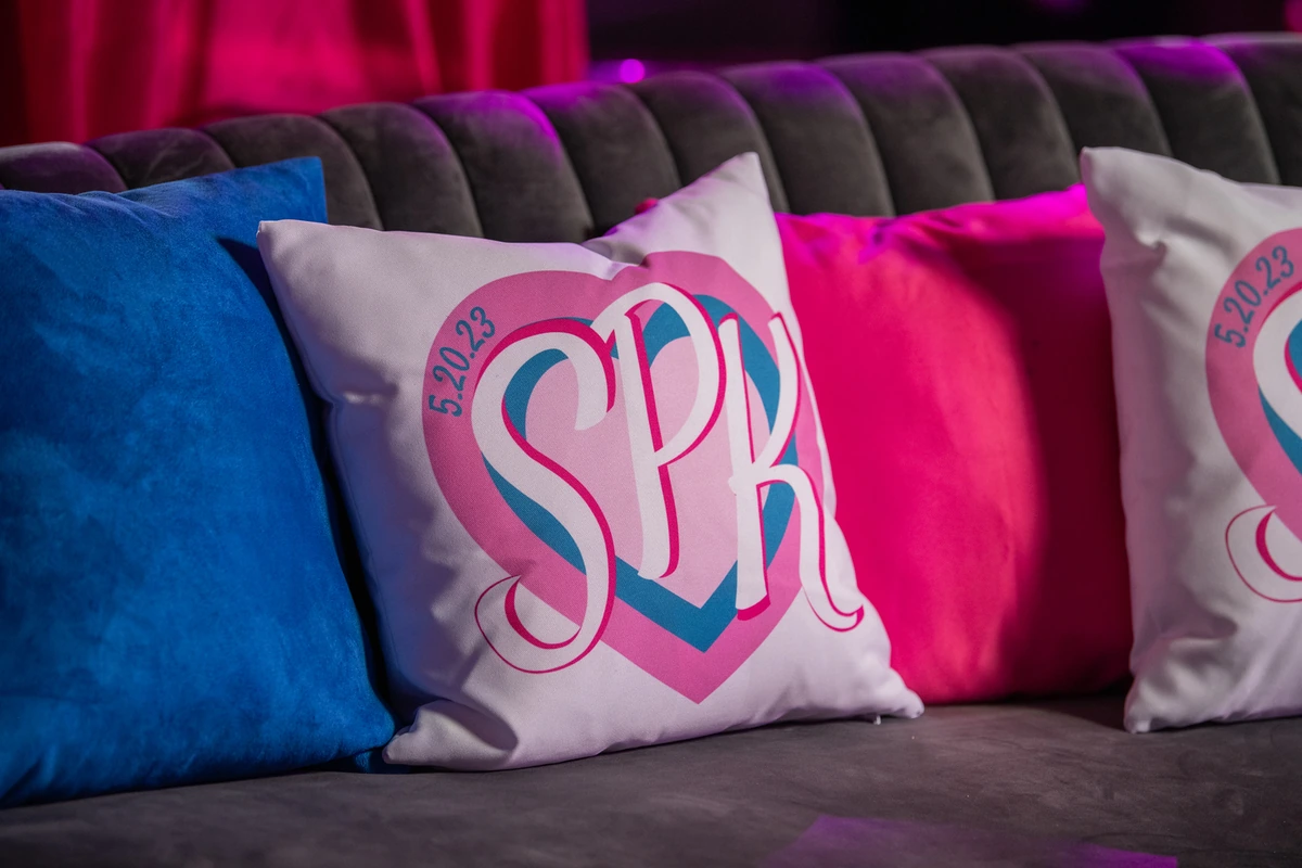 Sadie SPK pillow on a couch