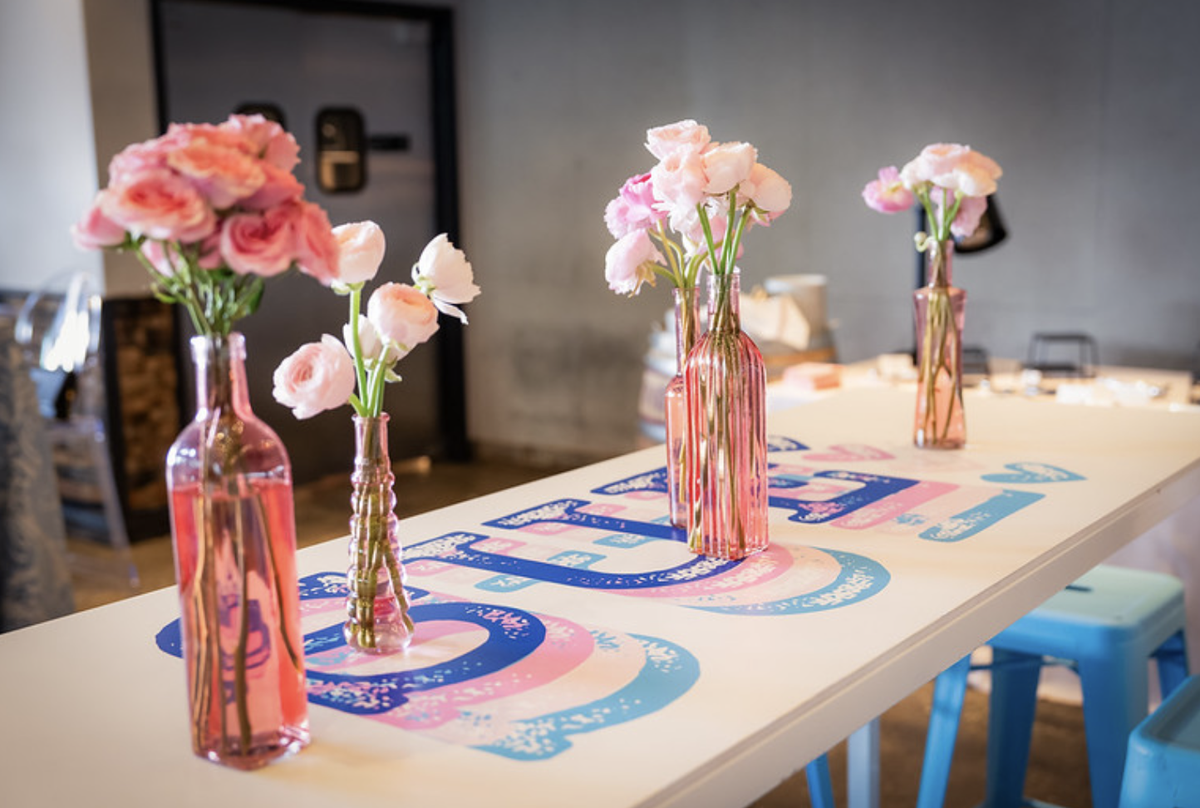 Sue floral tablescape and logo place settings