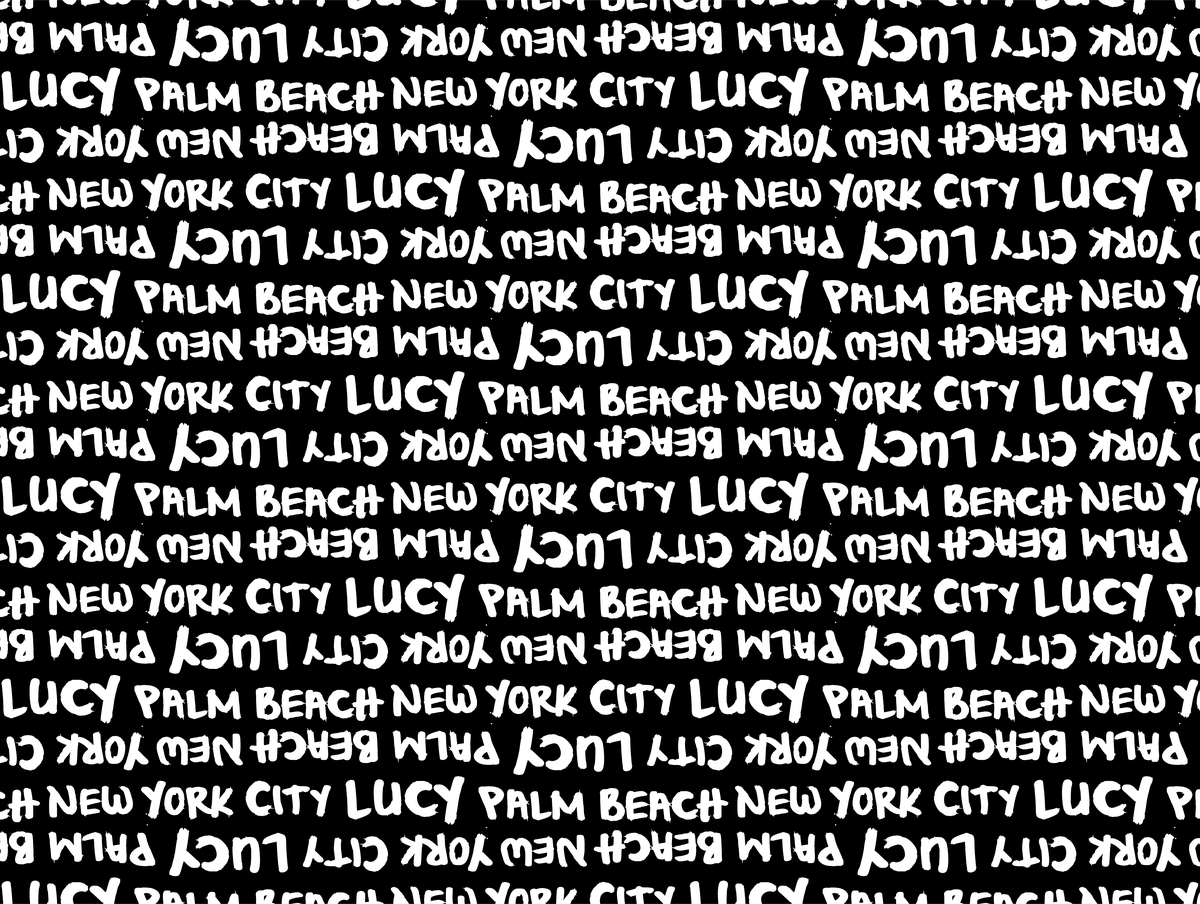 Lucy white New York City and Palm Beach lettering on black