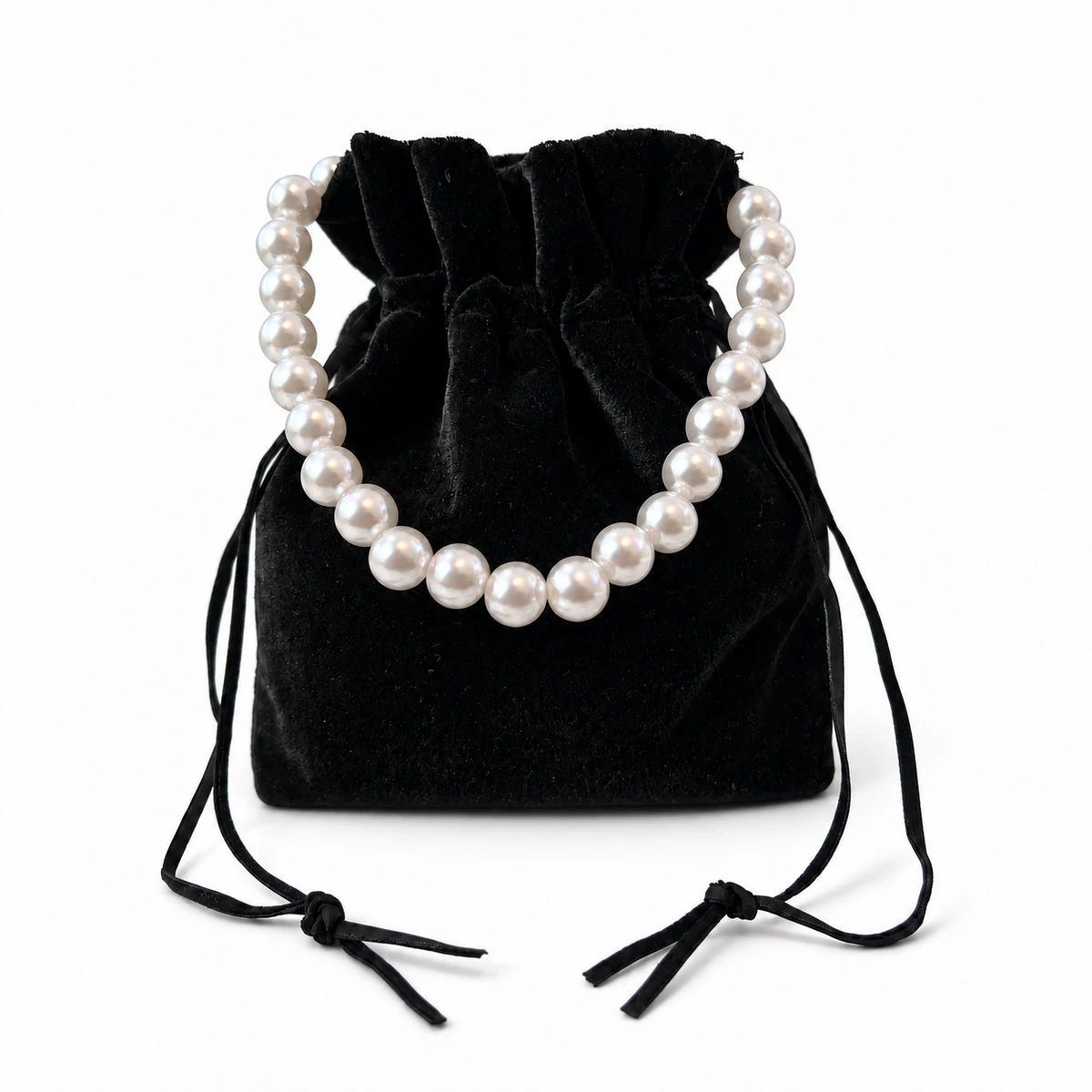 Ring Concierge black velvet pouch with draped pearl handle