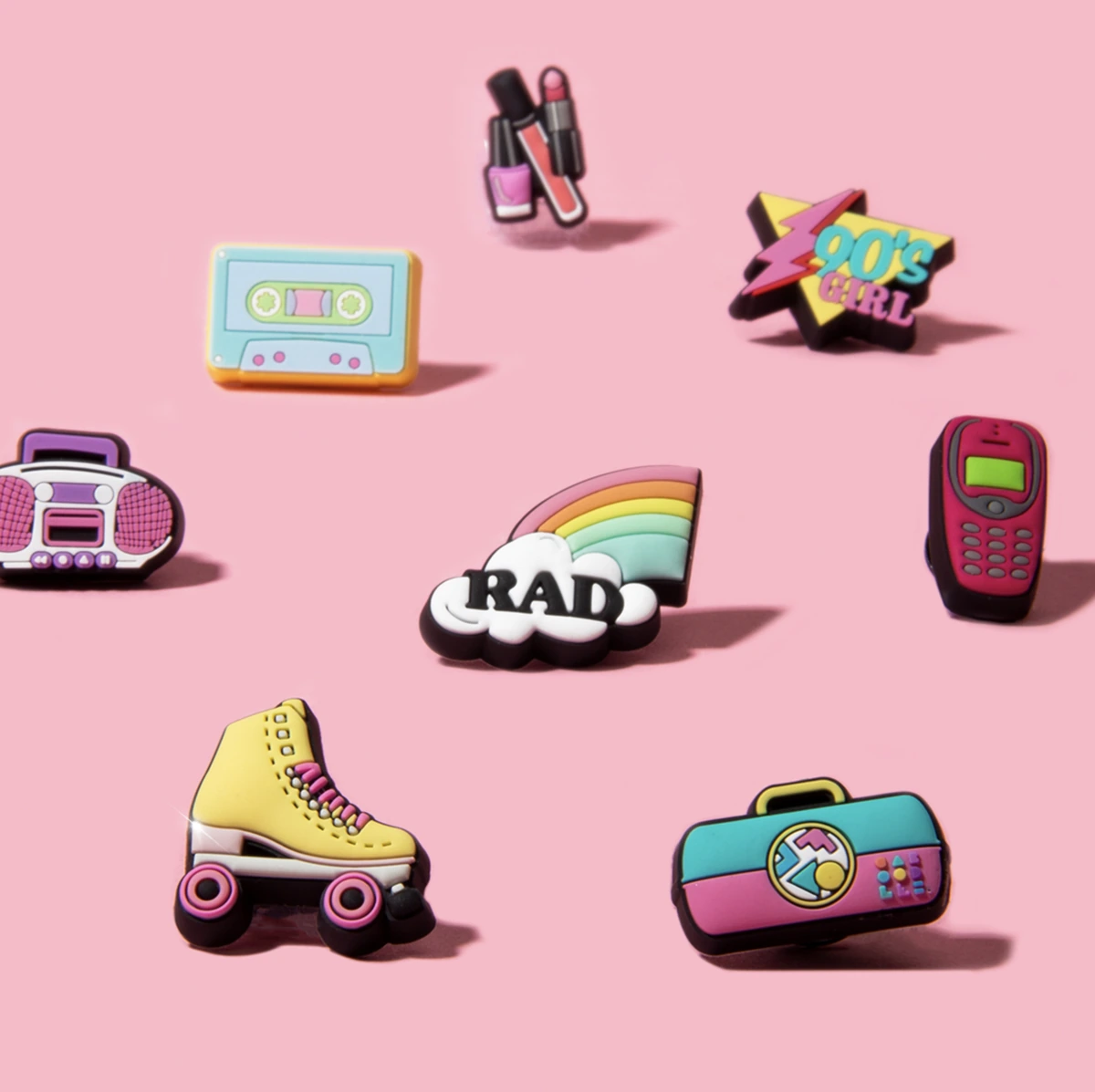 Caboodles case and Crocs styled on pink