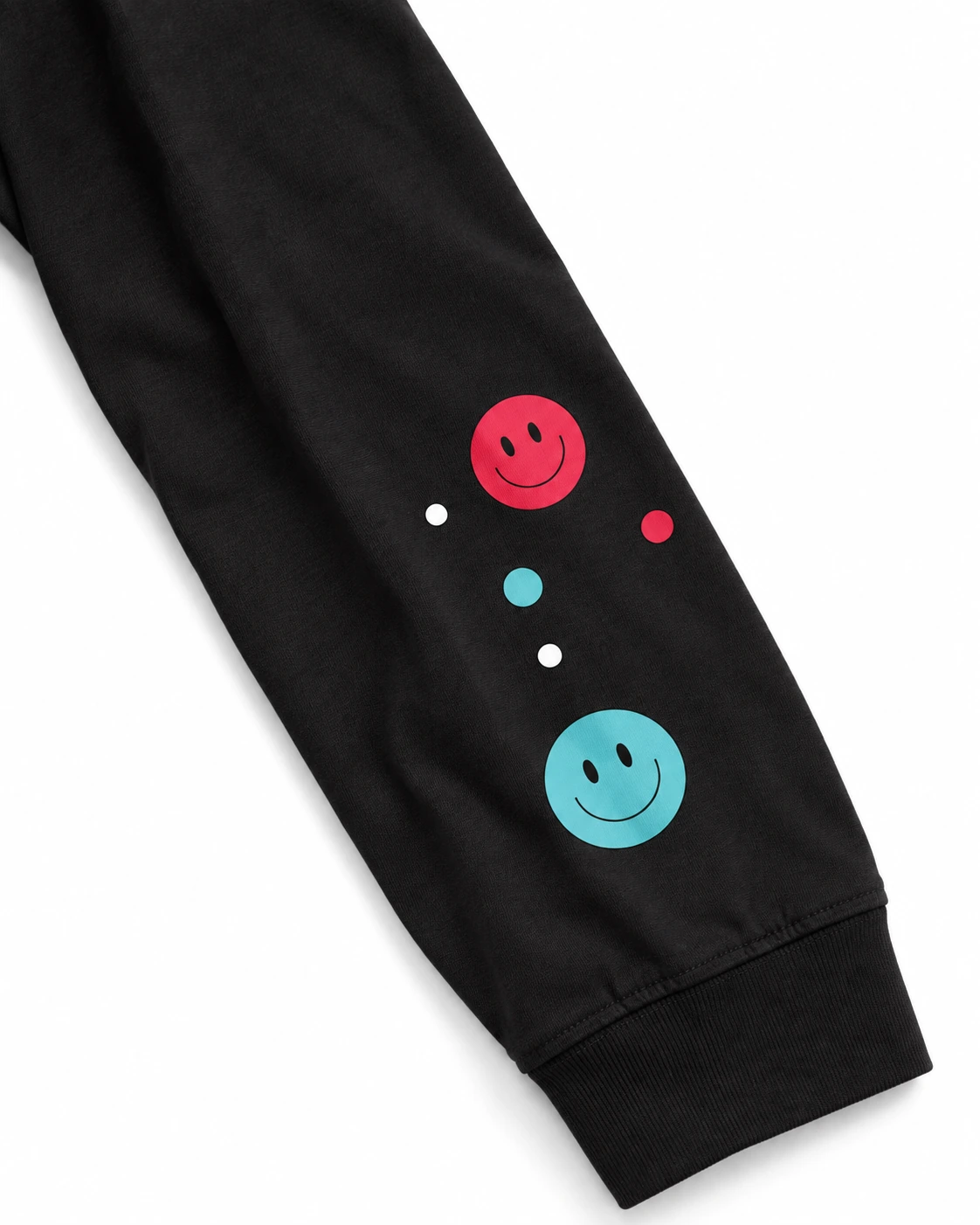 TikTok shirt sleeve with turquoise and pink smiley graphics