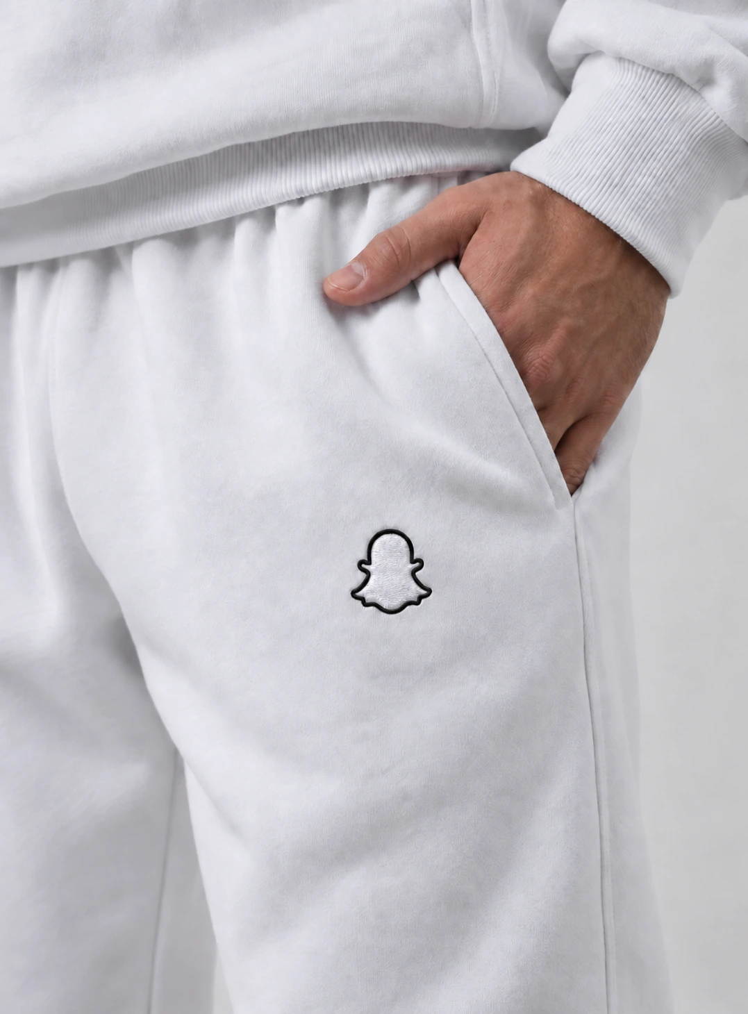 Snapchat white sweatpants pocket embroidery close-up